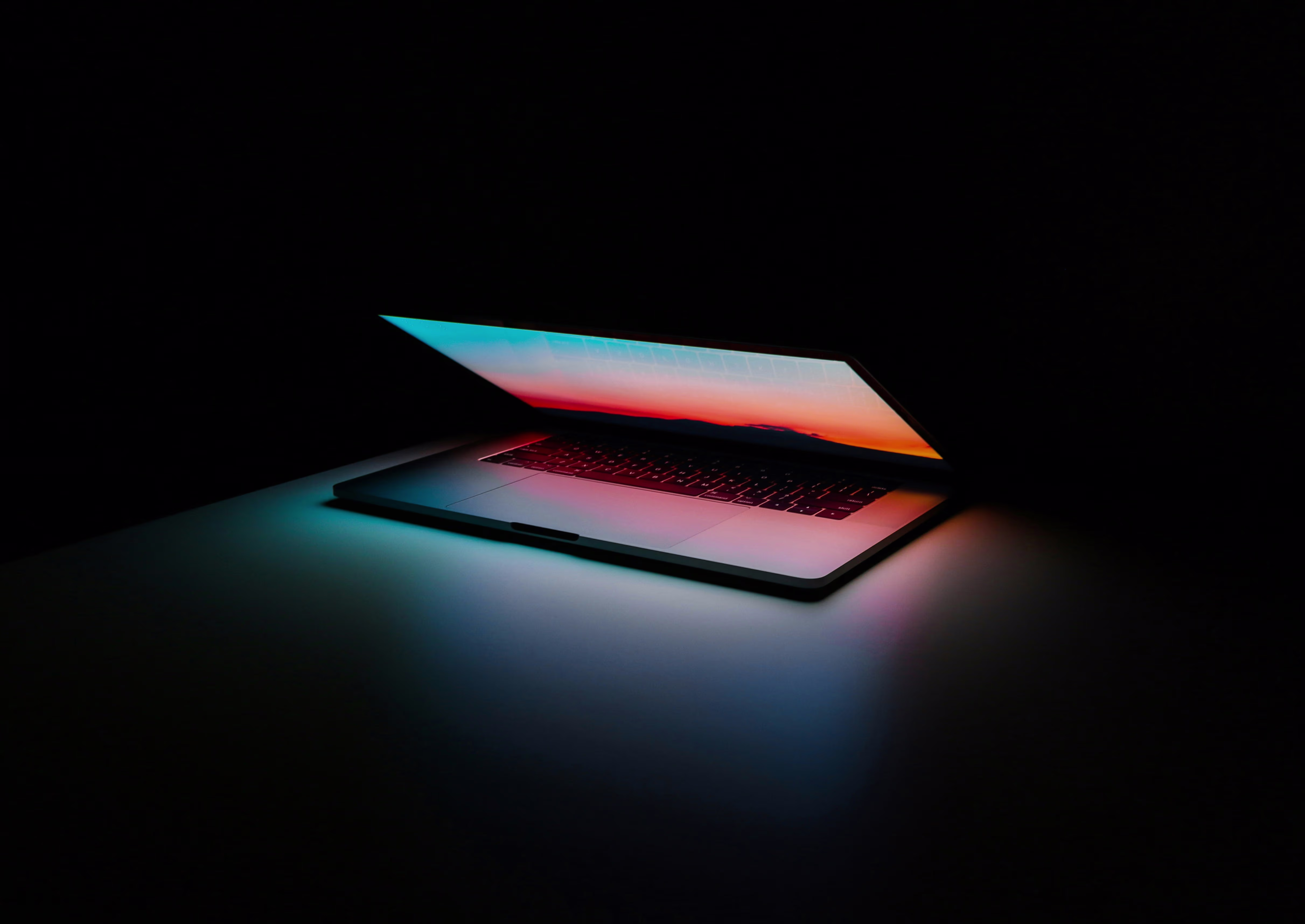 Laptop displaying creative digital design work